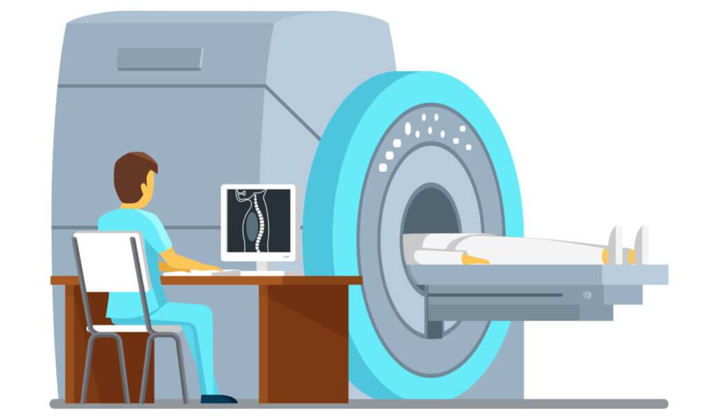 a doctor is sitting at a desk in front of a mri machine